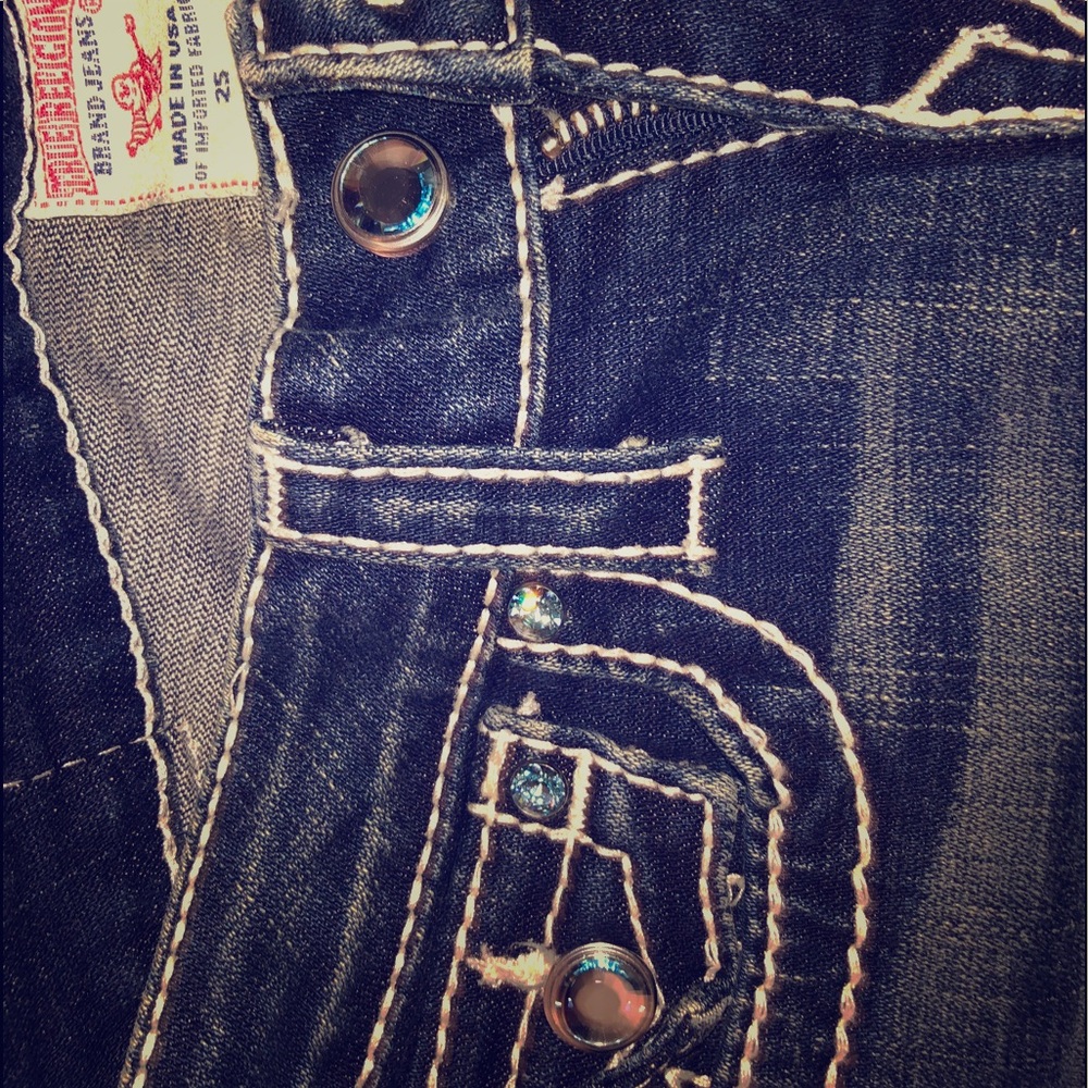 True Religion jeans w/ blue Swarovski detail. 25